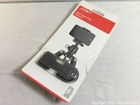 JOBY GripTight ONE Mount packaged in original retail packaging showing front side with smartphone illustration.