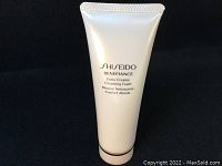 Front view of Shiseido Benefiance Extra Creamy Cleansing Foam 75mL tube on a black background.