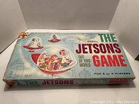 Top of the original box for the 1962 Transogram The Jetsons Out of This World game shows full front design and title