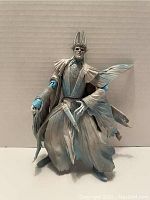 Photo of the 8 inch Twilight Ringwraith action figure showing detailed costume and hooded headpiece with crown-like top.