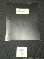 Black 3-ring binder labeled 'Pokemon' front cover.