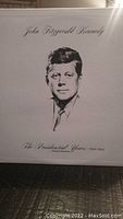Vinyl album cover showing a black and white portrait sketch of John Fitzgerald Kennedy with the text 'John Fitzgerald Kennedy' and 'The Presidential Years 1960-1963 Original Speeches' on a white background.