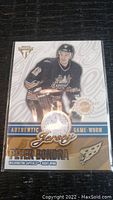 Front view of Peter Bondra trading card showing player image, team logo, and game-worn jersey patch embedded in card.