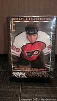 Front view of the sealed Eric Lindros hockey card set box showing player in Philadelphia Flyers jersey, number 88, and set title.