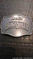 Full view of the vintage Lamb's Black Sheep belt buckle showing embossed logo.