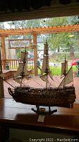 Full front view of the assembled model ship on its display stand