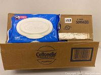 Photo showing one opened box with 8 packs of Cottonelle flushable wipes, each pack containing 42 wipes, featuring the Cottonelle FreshFeel branding.
