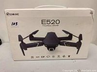 Photo of the Eachine E520 drone box showing brand and model information along with drone features.