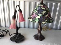 Both lamps shown together; floral stained glass lamp and double tulip flower lamp