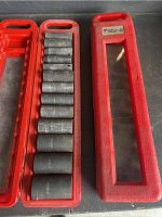 Two sets of Pittsburgh deep well impact sockets in red holders, one with missing socket, showing overall average condition