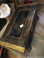 Top view showing worn wooden surface, glass inset on top for fish tank placeholder.