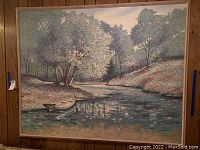 Framed landscape painting showing a river with a boat, trees, and lily pads, signed Anderson at bottom right.