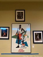 Wall display showing four framed basketball memorabilia, with large central 'Hare Jordan' poster and three smaller basketball action photos of Michael Jordan