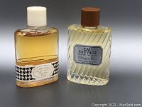 Two vintage Christian Dior perfume bottles side by side on a black background, showing general bottle shapes and caps.