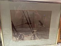 Framed photograph showing boat rigging and seagulls, signed and numbered 250/1500 by Joseph L Johnson in lower margins.