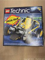 Front of the Lego Technic 8207 Go Cart box showing the yellow go cart model and special value sticker.