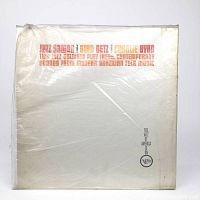Front cover of the Jazz Samba LP by Stan Getz and Charlie Byrd, white background with red and orange text.