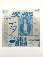 Front cover of the 12 inch vinyl record single by Daryl Jackson with title and photo.