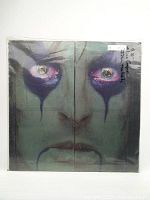 Front cover of Alice Cooper 12" vinyl LP featuring a close-up colored portrait with dramatic eye makeup.