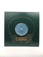 Front of 10" vinyl LP record in green paper sleeve with Mercury label visible in center cutout.