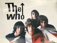 Poster of The Who with four band members and logo.