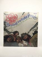 Front cover of The Guess Who vinyl LP album, showing band members and title artwork.