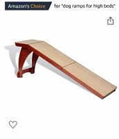 Full view of the pet ramp showing the cherry finish and carpeted walking surface.