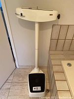 Full view of the vintage seca standing scale showing foot platform, vertical stand, and balance beam with height rod.
