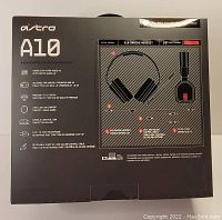 Back of the ASTRO A10 headset box showing features including compatibility with PC, Mac, PlayStation, Xbox, and mobile; long-lasting comfort; detachable boom mic; and in-line volume control cable.