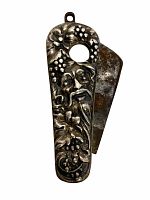 Front view of the antique sterling silver Green Man cigarette cutter showing detailed embossed Green Man face, grape leaves and grapes.