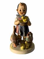 Front view of the vintage Hummel Feeding Time figurine showing girl holding bowl with chick and animals around her.