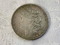 Obverse of the 1879 Morgan Silver Dollar showing Lady Liberty and date 1879.