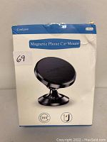 Box of Coolpow Magnetic Phone Car Mount showing front packaging, including branding and product image.