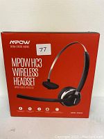 Photo of the front of the red box of the MPOW HC3 Wireless Headset with branding, image label, and model info visible.