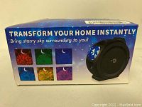 Box side showing product image and starry sky color options available