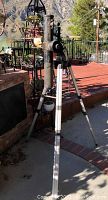 Side view of Meade Telestar B telescope on tripod showing optical tube, adjustment knobs, and tripod leg.