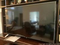 Front view of 60-inch TV on table