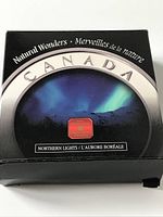 Outer packaging box with 'Natural Wonders' text and Northern Lights image.