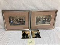 Two framed vintage Victorian fashion prints alongside two small silhouette plaques on white background.