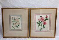Both framed watercolor floral paintings shown side by side against a white backdrop