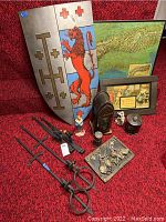 Overview of lot including shield, sconces, figurine, boxes, plaques and decorative hardware