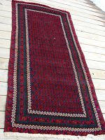 Full view of the rug laid flat showing overall design and condition