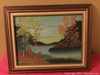 Front view of the vintage signed oil painting showing full artwork and frame.