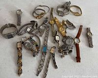 Overview photo showing 20 vintage women's wristwatches in assorted styles and band types.