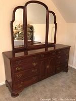 Full front view of dresser with tri-panel mirror attached