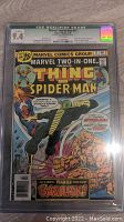Front cover of Marvel Two-In-One #17 comic book showing The Thing and Spider-Man on cover with CGC grade 9.4 label.