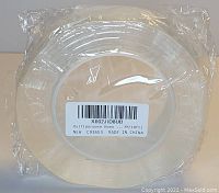Clear roll of multipurpose nano particle clear tape in original sealed plastic packaging, with label visible showing product name and length.