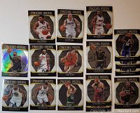 Set of 16 Optic Winner Stays NBA basketball cards laid out flat showing front designs.