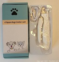Photo of closed packaging box for pet nail clipper and grinder set alongside the electric grinder tool with attached USB charging cable.