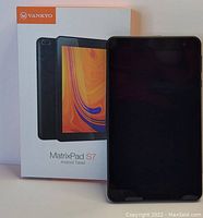 Front view of the Vankyo MatrixPad S7 tablet with packaging box showing device image and name